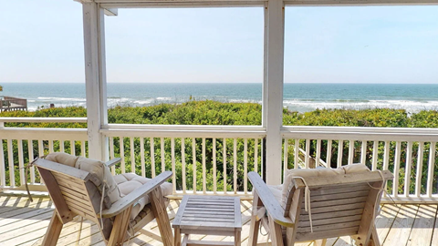 chairs on deck with ocean view